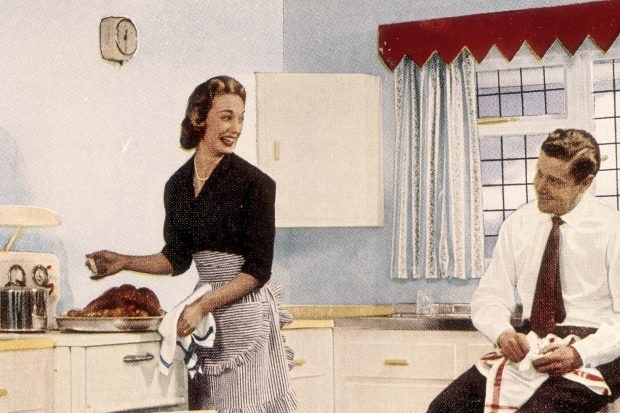 A 1950s advertisement for the paint company Robbialac, depicting a couple preparing food. (Photo by Getty Images)