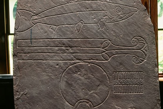 A Pictish stone carving featuring a salmon